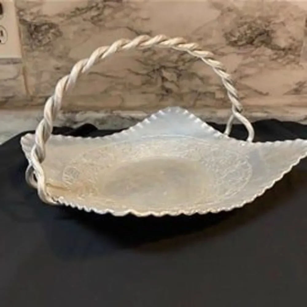 * hand-forged hammered aluminum basket engraved floral bouquet twisted handle